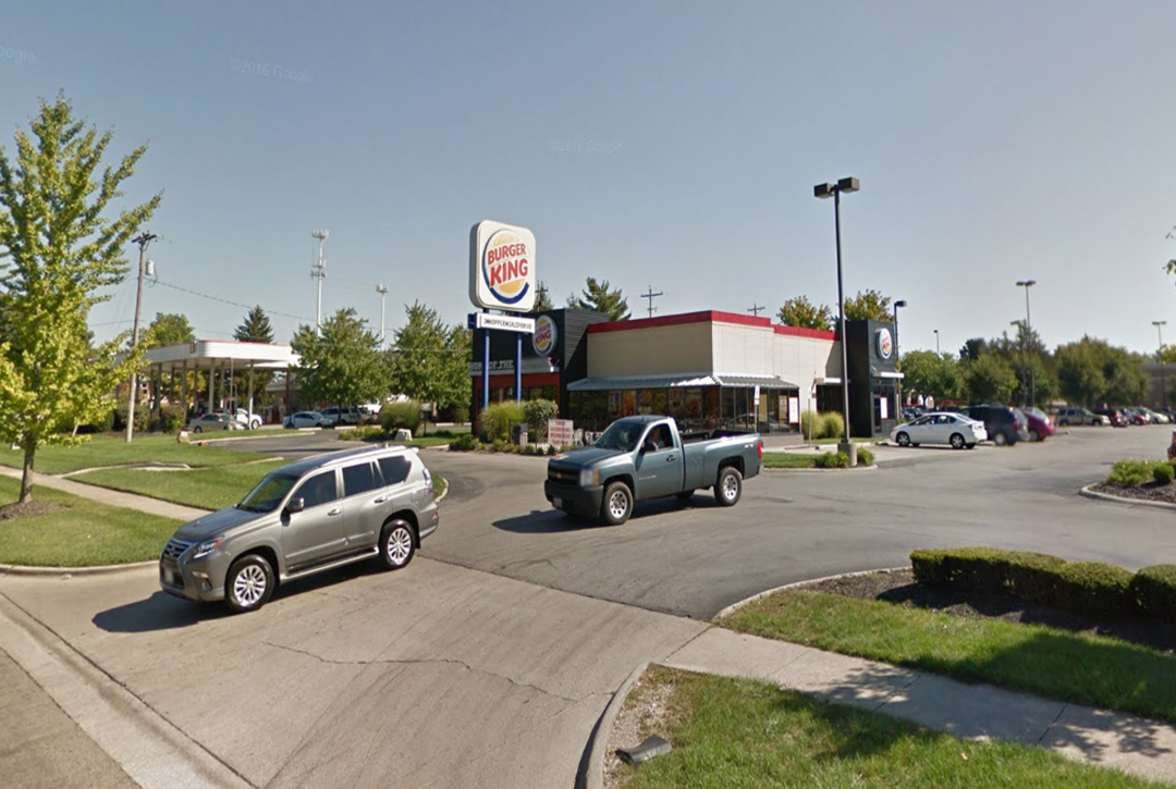 Exterior of a net-leased restaurant and its roadside sign in the Ohio retail portfolio